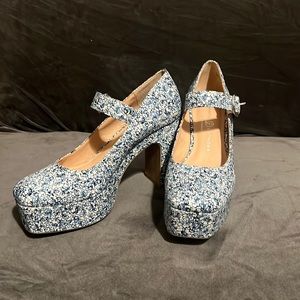 Floral platforms never been worn.